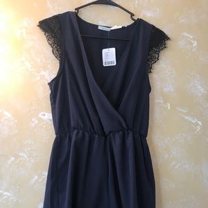 Navy romper with black lace details